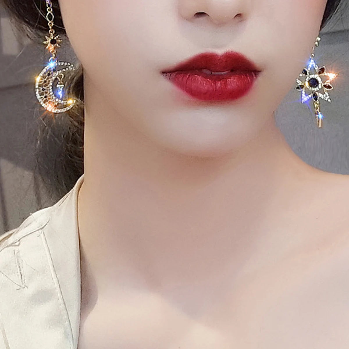 Elegant silver asymmetrical star and moon earrings