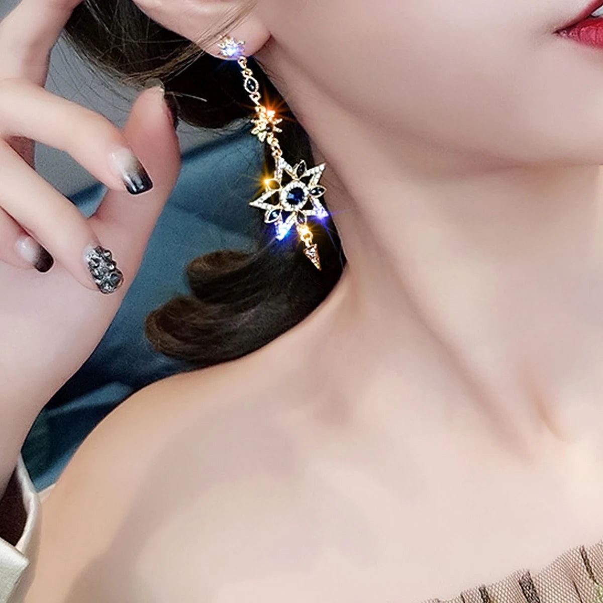 Elegant silver asymmetrical star and moon earrings