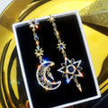 Elegant silver asymmetrical star and moon earrings