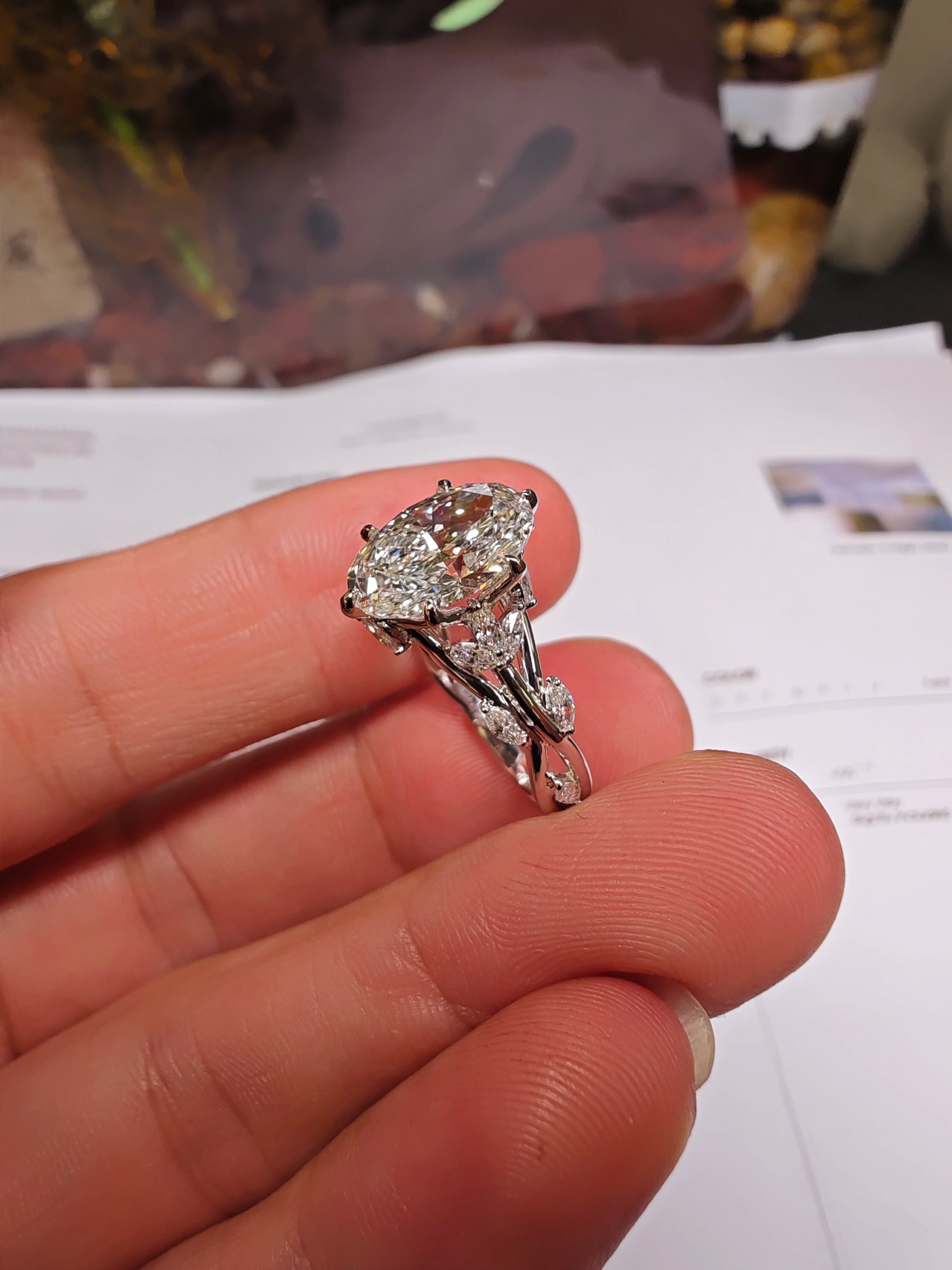 An elegant 2-carat oval diamond ring in 18K gold, perfect for a marriage proposal